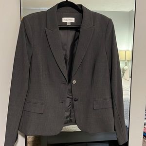 Calvin Klein blazer. Basically brand new. Only has been worn twice.